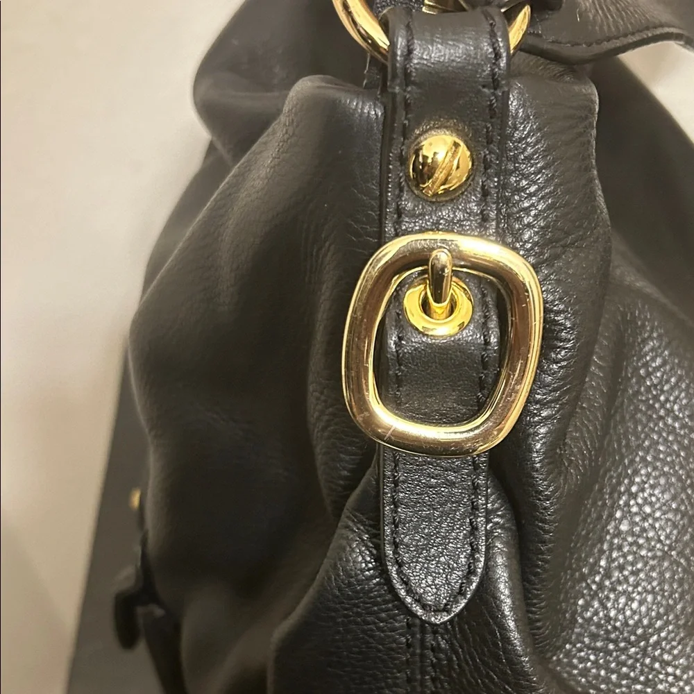 Michael Kors Black Hobo Bag with Gold Accents